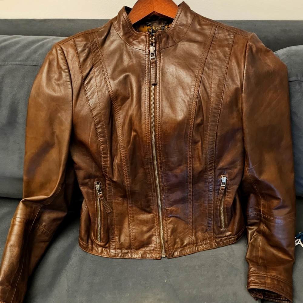 Black rivet women's leather jacket